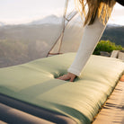 Klymaloft Sleeping Pad, Green Regular, Lifestyle Up-Close Touching Fabric