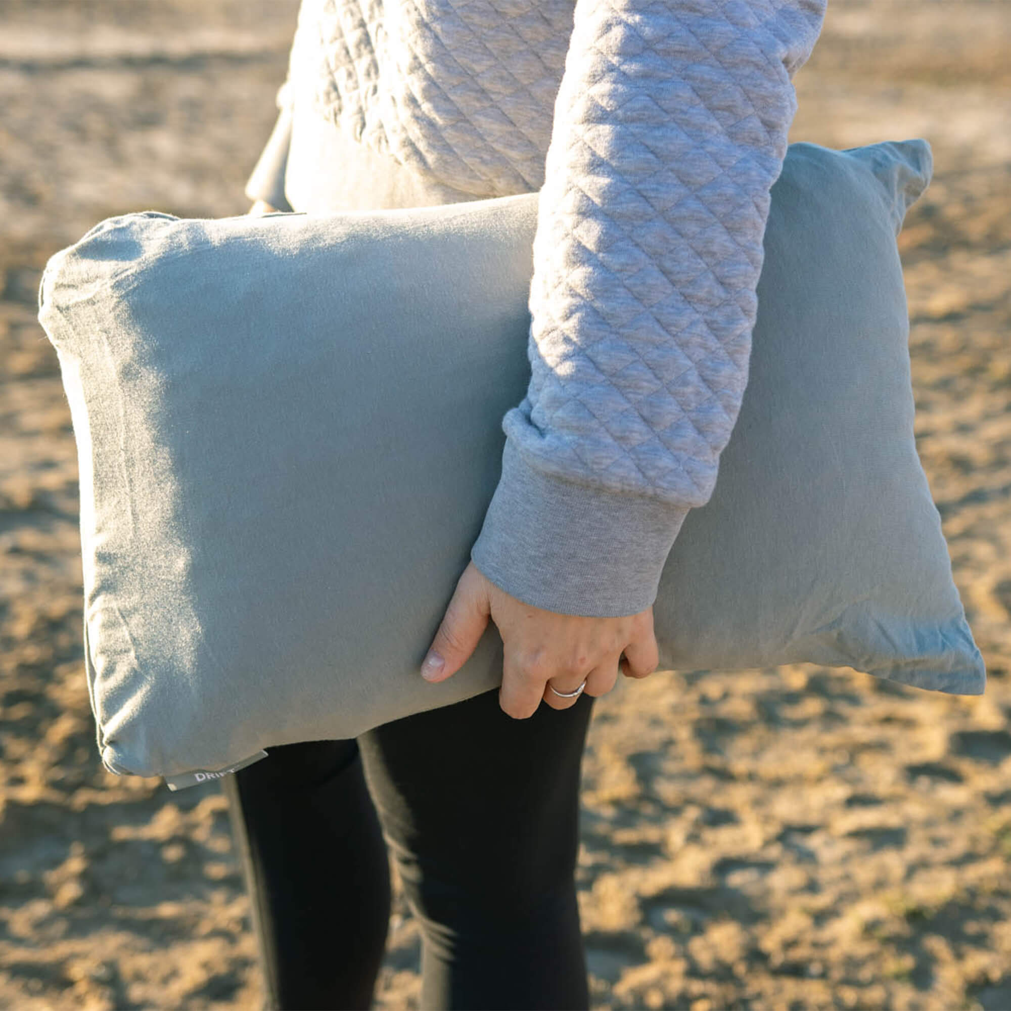 Drift Camp Pillow, Green Regular, Lifestyle Carrying the Pillow