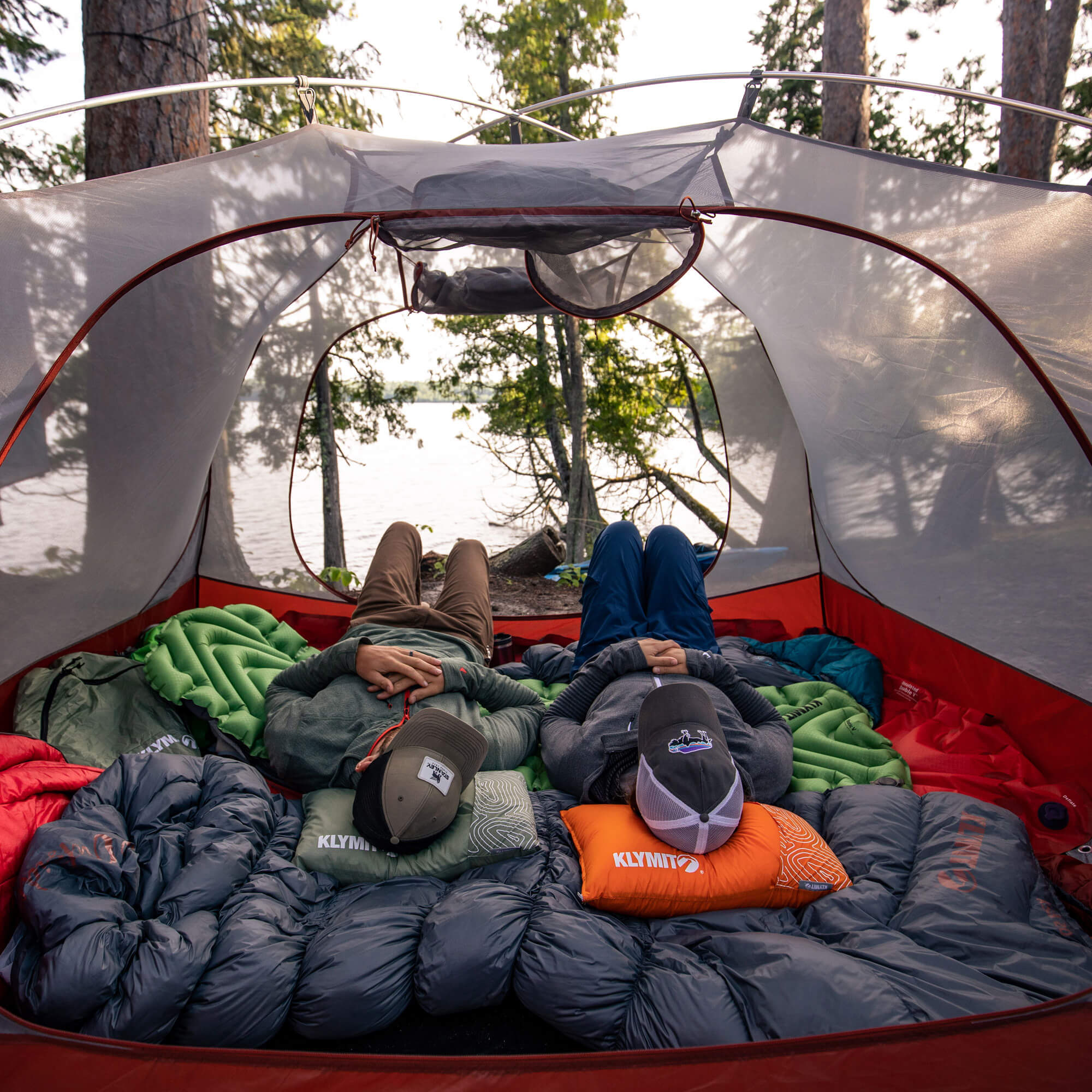 Drift Camp Pillow, Orange Regular, Lifestyle Laying Inside Tent