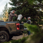 Horizon Overland Blanket, Gray, Lifestyle Tossing the Storage Back