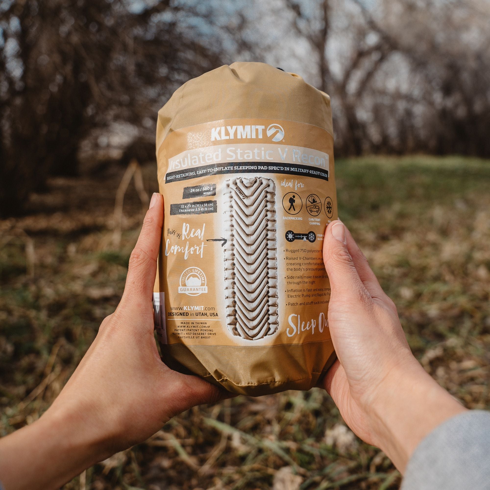 Insulated Static V Sleeping Pad, Recon, Lifestyle Holding the Stuff Sack