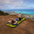 Static V2 Sleeping Pad, Green, Lifestyle Woman Lying on Pad