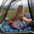 Static V Luxe SL Sleeping Pad, Blue, Lifestyle Woman Looking Outside Tent