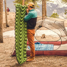 Static V Sleeping Pad, Green, Lifestyle Inflating the Pad