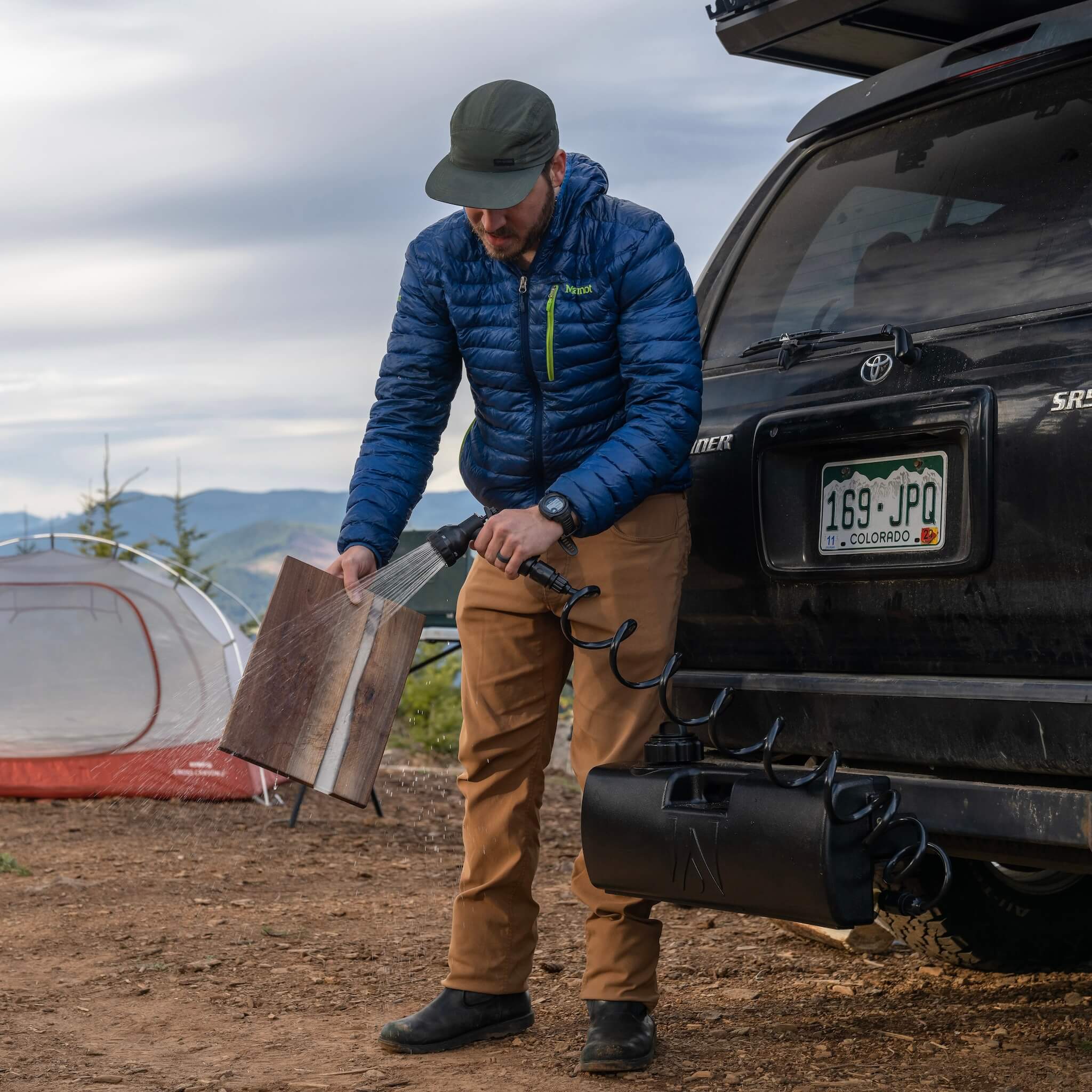WaterPORT 4.0 Gallon Water Tank, Black, Lifestyle Washing Cutting Board