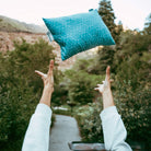 Coast Travel Pillow, Teal, Lifestyle Throwing Pillow Into the Air