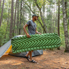 Static V Sleeping Pad, Green, Lifestyle Carrying the Pad Outdoor