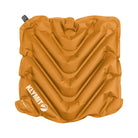 Orange inflatable V Seat with Klymit branding on a white background
