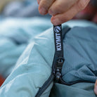 Close-up of the zipper pull on a Klymit Wild Aspen 20 Regular sleeping bag.